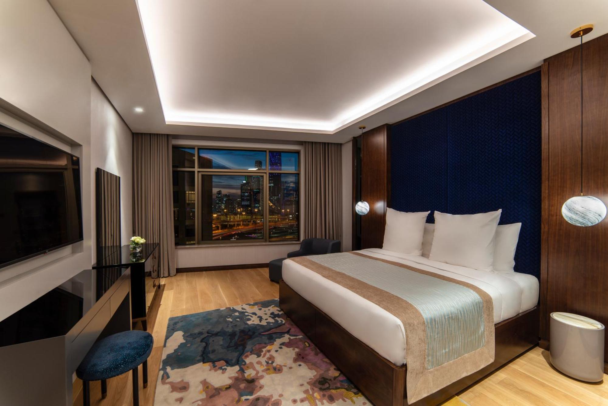 Movenpick Hotel And Residences Riad Exterior foto Deluxe Suite
